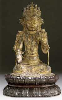 A gilt-lacquered bronze model of Guanyin 16th/17th Century